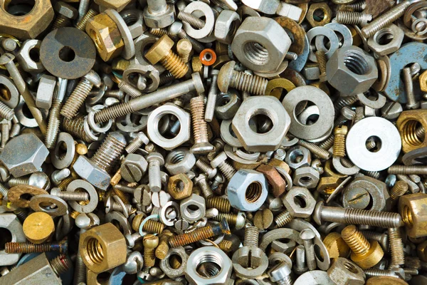 Iron screw nuts background — Stock Photo, Image