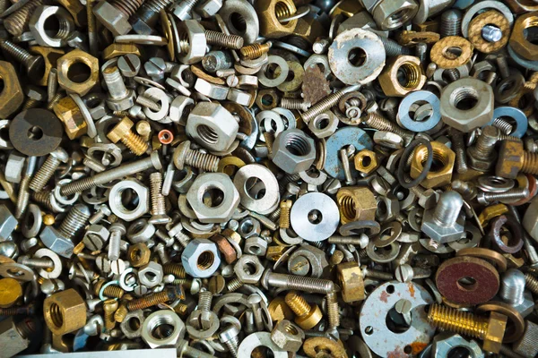 Iron screw nuts background — Stock Photo, Image