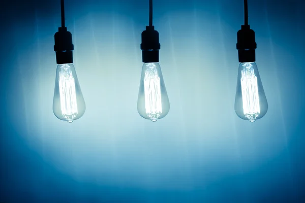 Three vintage bulb lamps with cold light — Stock Photo, Image