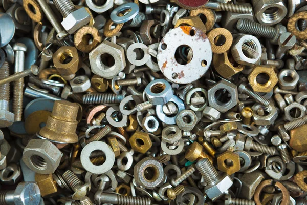 Iron screw nuts background — Stock Photo, Image