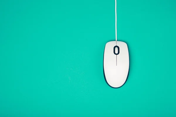 Computer mouse on emerald background — Stock Photo, Image