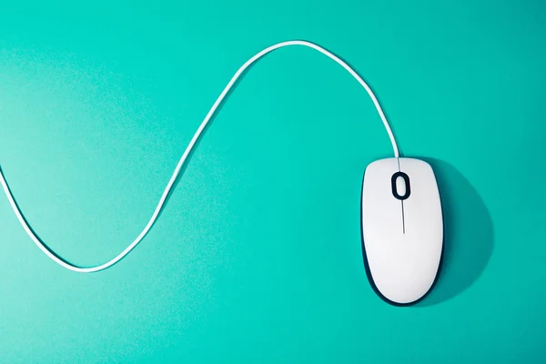 Computer mouse on emerald background — Stock Photo, Image