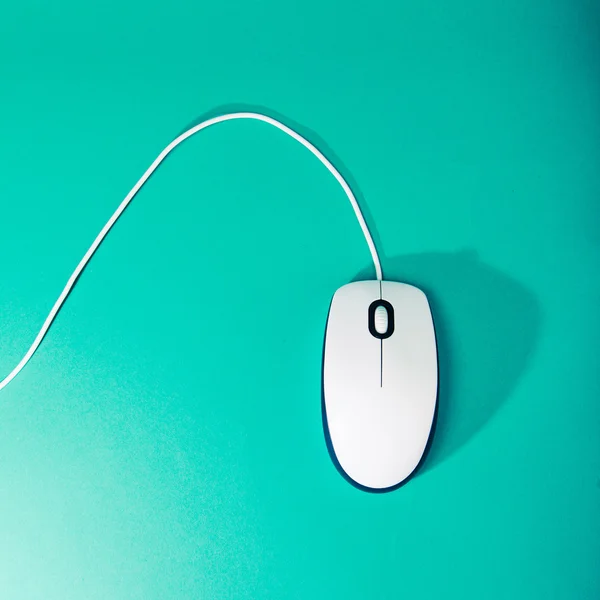 Computer mouse on emerald background — Stock Photo, Image