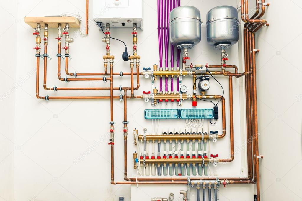 Independent heating system in boilerhouse Stock Photo by ©nikkytok