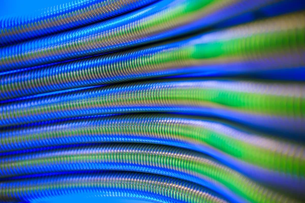 Corrugation metal pipes abstract blue background — Stock Photo, Image
