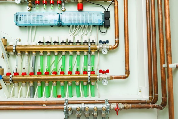 Underfloor heating control system in boiler-room — Stock Photo, Image