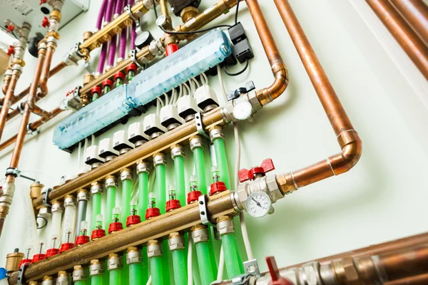 Underfloor heating control system in boiler-room — Stock Photo, Image