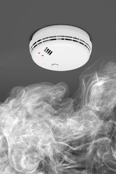 Smoke detector of fire alarm in action — Stock Photo, Image