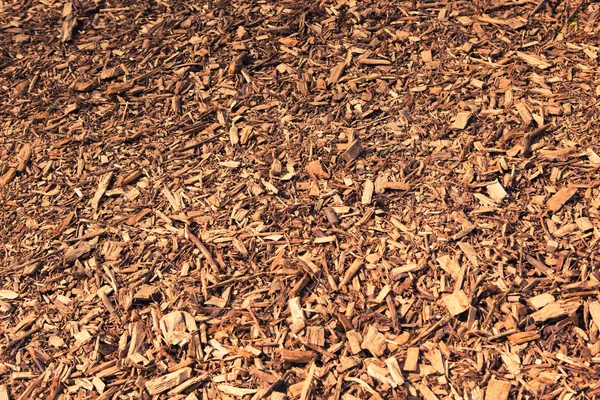 Brown wood chips background — Stock Photo, Image