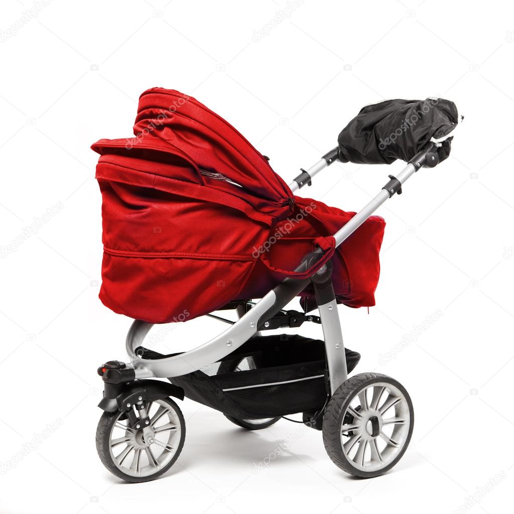red baby stroller isolated on white
