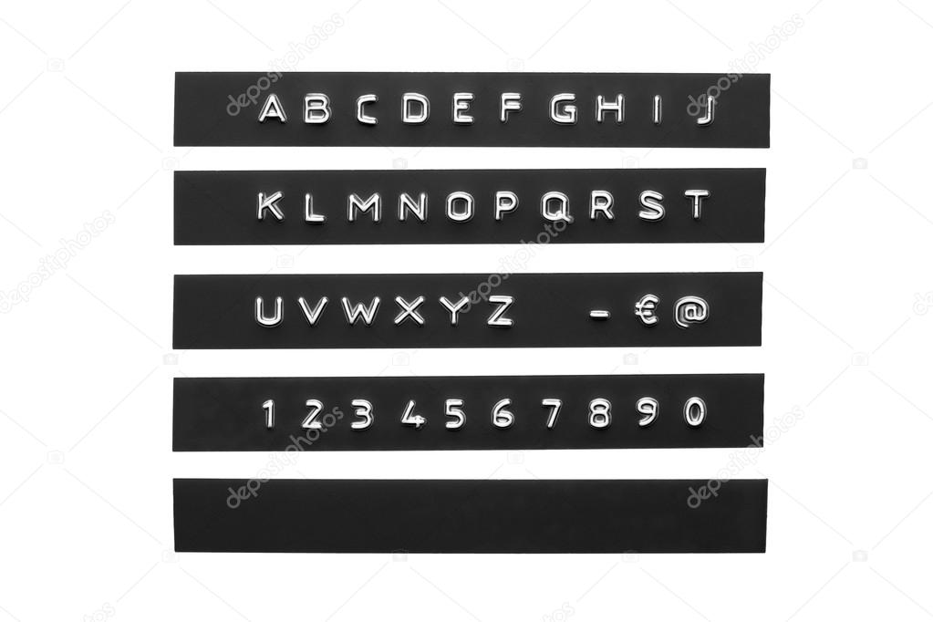 Embossed alphabet on black plastic tape