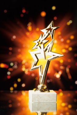 altın yıldız Ödülü parlak kıvılcımlar arka plan