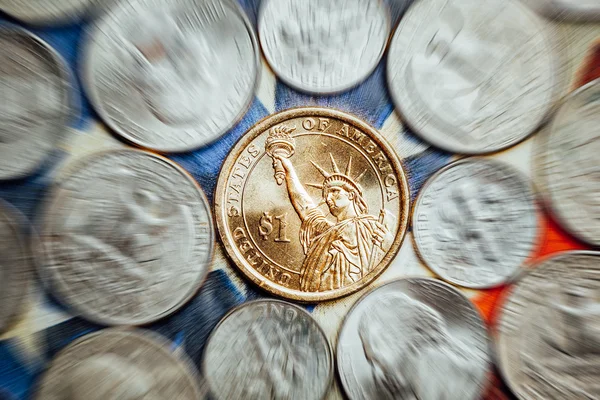 Americký dolar a mince centů s zoom efekt — Stock fotografie