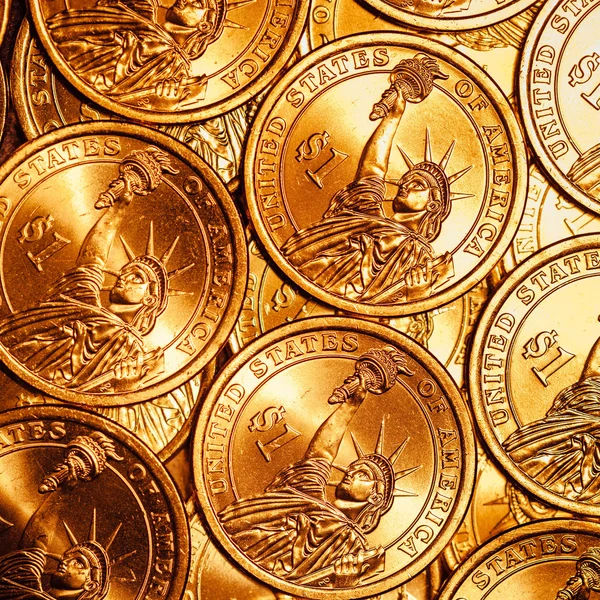 Arany dollár érmék háttér — Stock Fotó