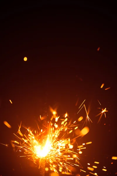 Christmas background with sparkler and copy-space — Stock Photo, Image