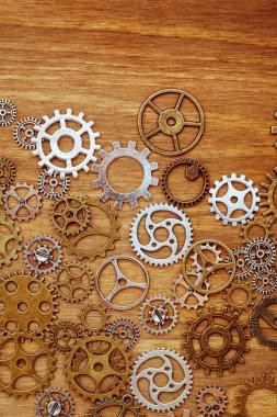 ahşap arka plan üzerinde Vintage dişli tekerler