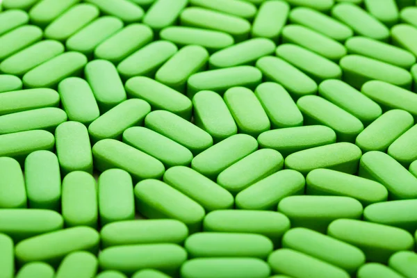 Nahrungsergänzungsmittel, grüne Vitaminpillen — Stockfoto