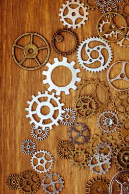 ahşap arka plan üzerinde Vintage dişli tekerler