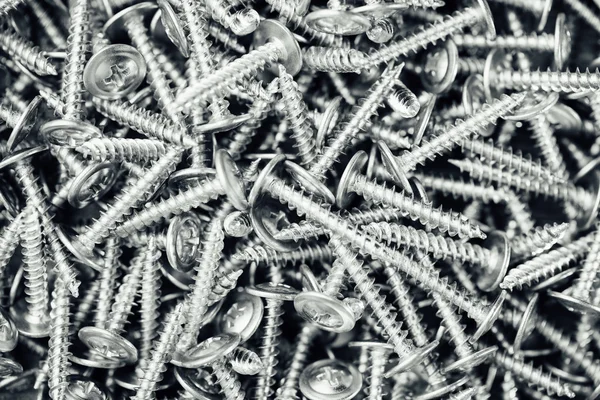 Screws fasteners hardware backdrop, macro view — Stock Photo, Image