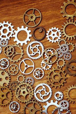ahşap arka plan üzerinde Vintage dişli tekerler