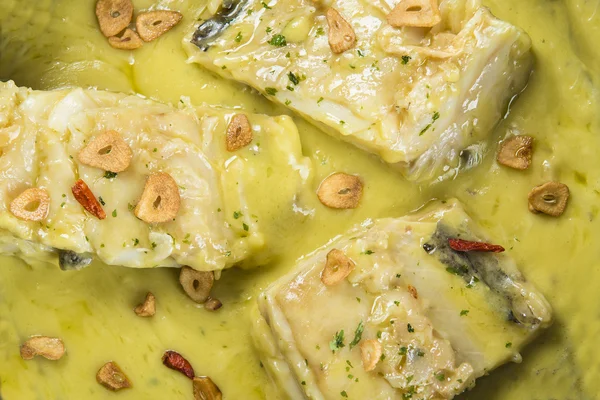 Salt cod in a pilpil sauce — Stock Photo, Image