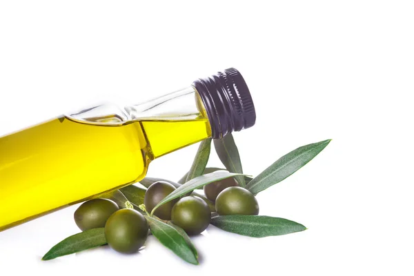 Olive oil bottle with leaves isolated on white background — Stock Photo, Image