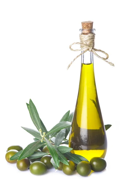 Olive oil bottle and wooden spoon isolated — Stock Photo, Image