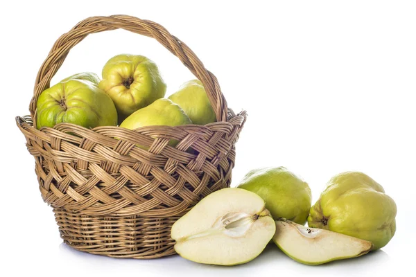 Basket with quinces isolated on white background — Stock Photo, Image