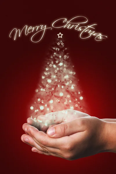 Christmas card with a child hands in red — Stock Photo, Image