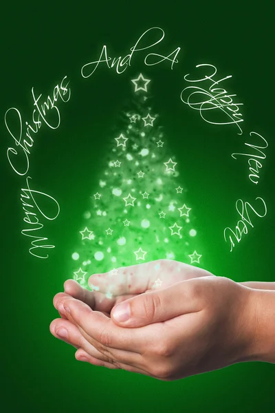 Christmas card with a child hands in green — Stock Photo, Image