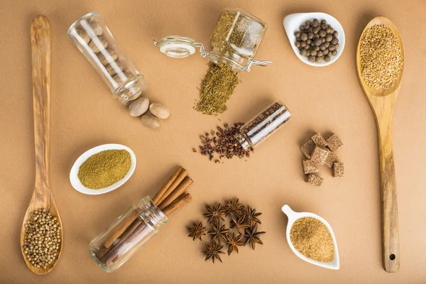 Brown spices on a brown background — Stock Photo, Image