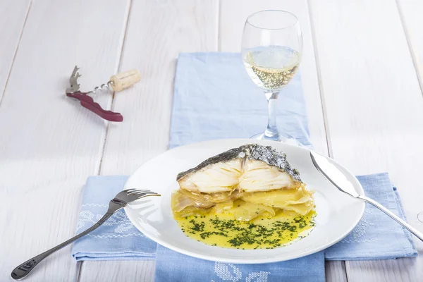 Oven baked cod fish with potatoes — Stock Photo, Image