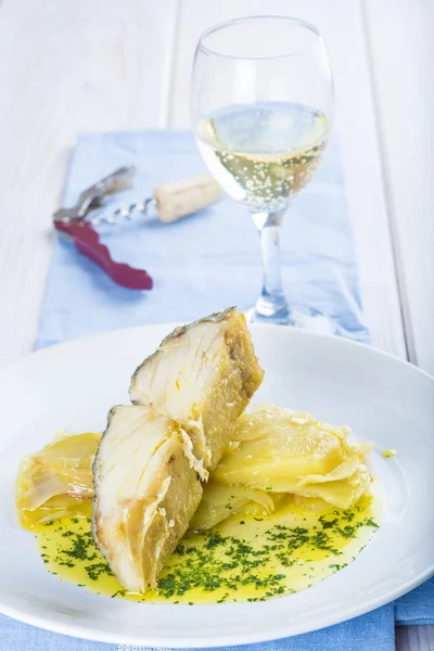 Oven baked cod fish with potatoes Royalty Free Stock Images
