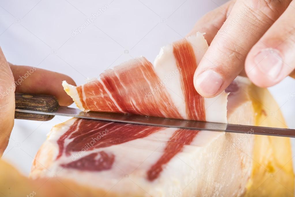 Professional cutting of serrano ham
