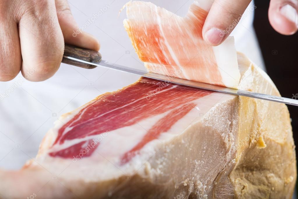 Professional cutting of serrano ham