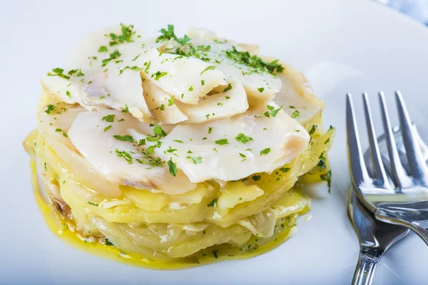 Oven baked cod fish with potatoes — Stock Photo, Image