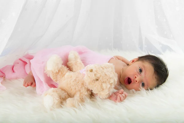 Happy newborn girl whit her teddy — Stock Photo, Image