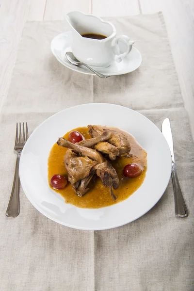 Poussin with grapes sauce — Stock Photo, Image