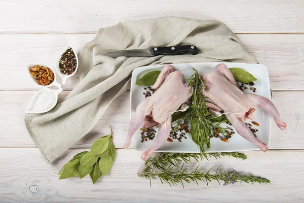 Raw poussin with herbs and spices — Stock Photo, Image