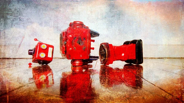 retro red robot broken on a old wooden floor 404 error concept