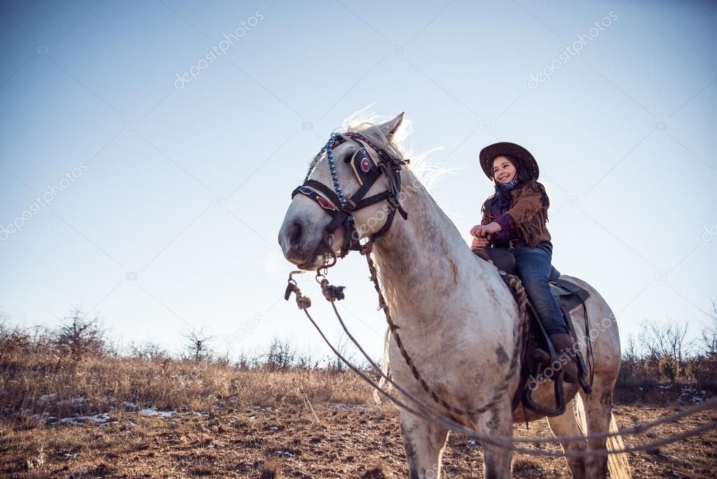 cute girl on a horse