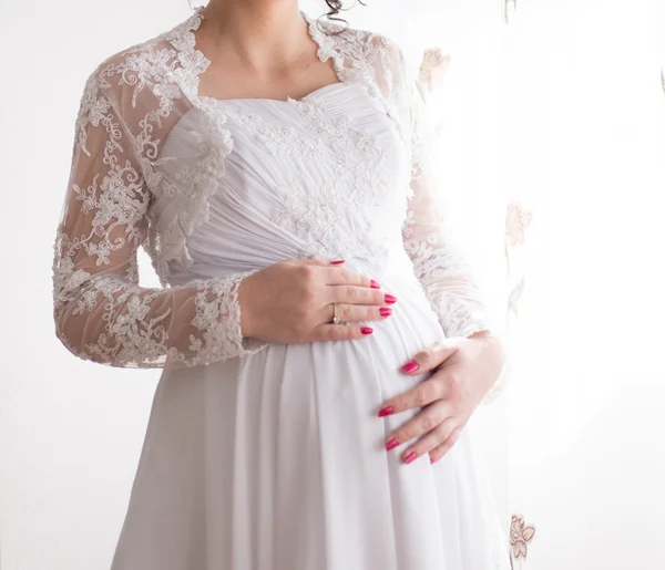 Pregnant unrecognizable bride — Stock Photo, Image