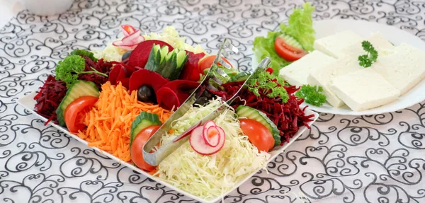 Fresh salad on a platter — Stock Photo, Image