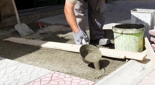 Municipal construction workers paving — Stock Photo, Image