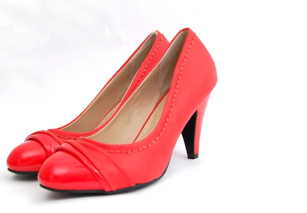 Red female shoes on a white background. — Stock Photo, Image