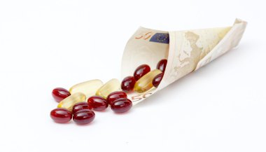 Krill yağı kapsülleri, euro banknot dışarı dökmek