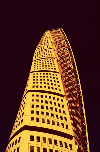 MALMO, SWEDEN - APRIL 9, 2013: Turning Torso skyscraper on aPRIL 8, 2013 in Malmo, Sweden. Designed by Santiago Calatrava, it is the most recognized landmark of Malmo and Sweden today.