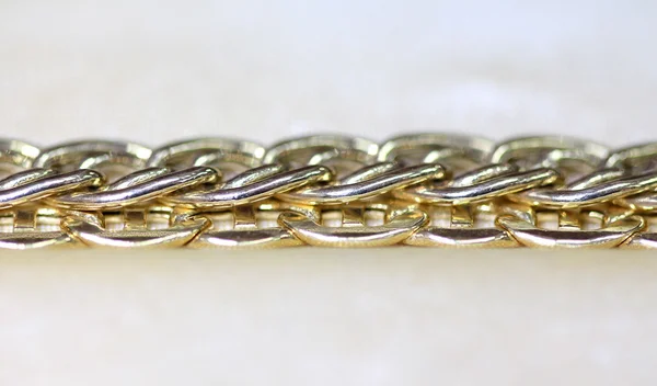 Namaakjuwelen. Gouden armband — Stockfoto