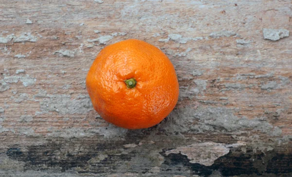 Oranžové plody na pozadí Klihy pro dřevo — Stock fotografie