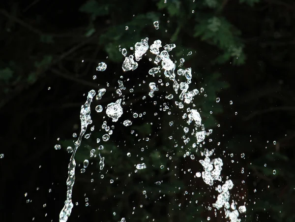 Water drops from fountain. Selective focus — Stock Photo, Image